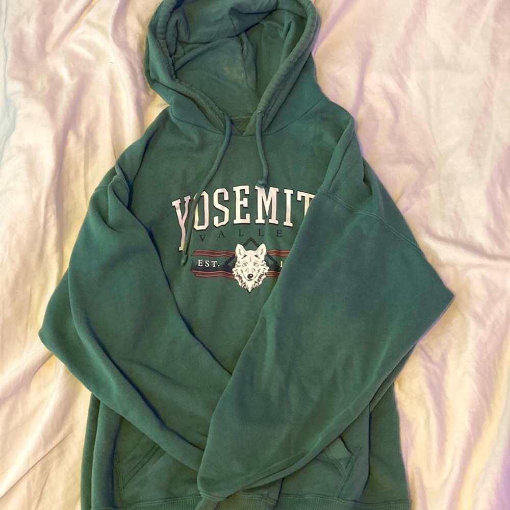 Size small dark green hoodie